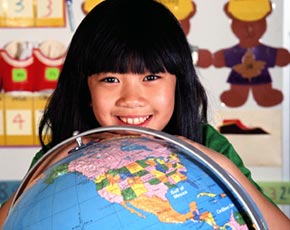 child with globe